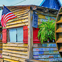 Buy canvas prints of Flag Tags and Water Wheel by Darryl Brooks