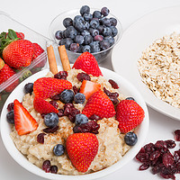 Buy canvas prints of Oatmeal with Cut Strawberries by Darryl Brooks
