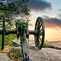 Buy canvas prints of Cannon into Sunrise by Darryl Brooks