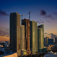 Buy canvas prints of Hotels and New Towers at Sunset by Darryl Brooks