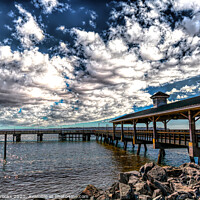 Buy canvas prints of Pier Under Gathering Clouds by Darryl Brooks