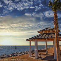 Buy canvas prints of Pavilion Under Palm Tree by the Sea at Sunset by Darryl Brooks