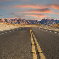 Buy canvas prints of Road Into the Desert at Dusk by Darryl Brooks