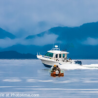 Buy canvas prints of Small Fishing Boat Passed by Large Fishing Boat by Darryl Brooks