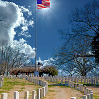 Buy canvas prints of Sun Behind Flag at Cemetery by Darryl Brooks