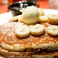 Buy canvas prints of Fresh Banana Pancakes with Butter and Syrup by Darryl Brooks