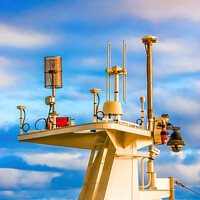 Buy canvas prints of Ships Communication Gear Under Colorful Skies by Darryl Brooks