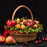 Buy canvas prints of Basket with fresh fruits and berries on a black background by Dobrydnev Sergei