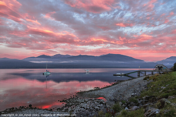Lake Te Anau Sunset on the south island of New Zea Picture Board by Jon Jones