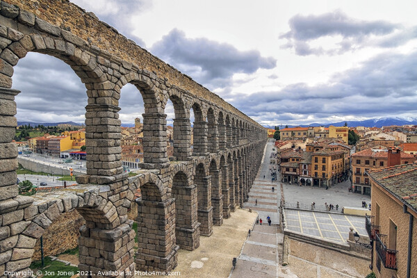 Roman Aqueduct at Segovia in Spain  Picture Board by Jon Jones