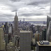 Buy canvas prints of Manhattan and the Empire State Building by Jon Jones