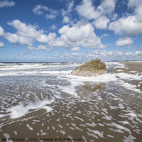 Buy canvas prints of Foaming sea and fluffy clouds by North Wales Photography