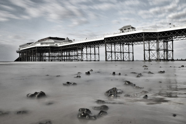 "Tranquil Drama: Cromer Pier's Enchanting Monochro Picture Board by Mel RJ Smith