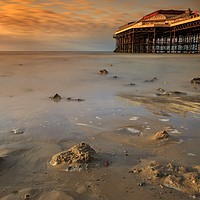 Buy canvas prints of "Ethereal Dance: A Mesmerizing Cromer Pier Sunset" by Mel RJ Smith