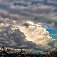 Buy canvas prints of Cloudscape over Breedon on the Hill by Iain Merchant