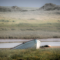 Buy canvas prints of Old wood boat parked alone on the sand  by Jason Jones