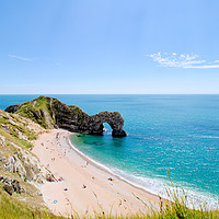 Buy canvas prints of Durdle door and beach in the Summer sunshine. by Simon J Beer