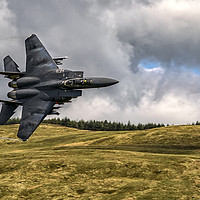 Buy canvas prints of Strike Eagle F-15 through the Mach Loop by Emma Woodhouse
