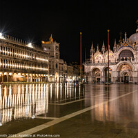 Buy canvas prints of St Mark's Basilica stands in a flooded piazza at night by Sarah Smith