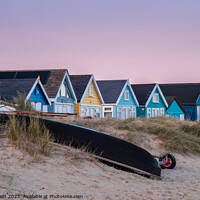 Buy canvas prints of A Colourful Sunset at Hengistbury Head Beach Huts by KB Photo