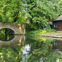 Buy canvas prints of Reflection of bridge, Itchen River Winchester by KB Photo