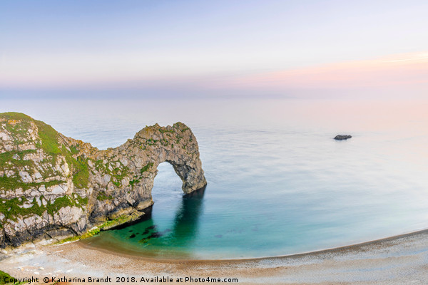 Calming sunset at Durdle Door, Dorset Picture Board by KB Photo