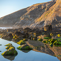 Buy canvas prints of Tregardock Beach Rock reflections in Cornwall by KB Photo