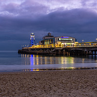 Buy canvas prints of Bournemouth Pier illuminated at night by KB Photo