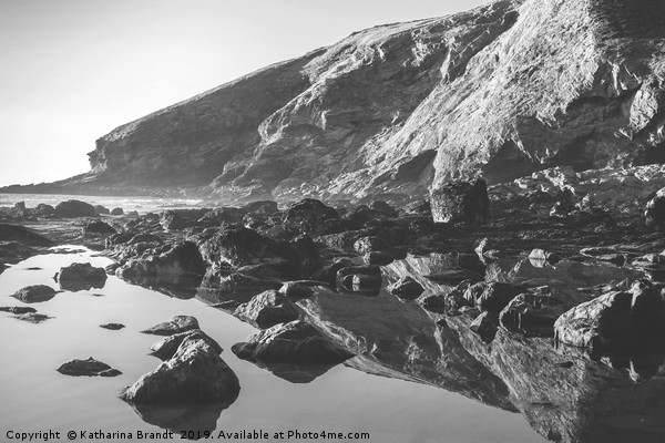 Tregardock Beach Rock reflections in Cornwall Picture Board by KB Photo