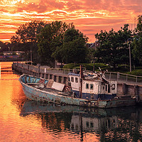 Buy canvas prints of Abandoned boat sunset by KB Photo