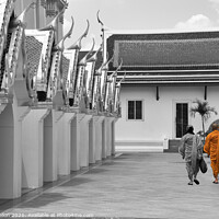 Buy canvas prints of Two monks(selective colour) by Kevin Hellon