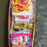 Buy canvas prints of Boat vendor by Kevin Hellon