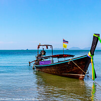 Buy canvas prints of Long tail boat on the Andaman Sea  by Kevin Hellon