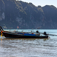 Buy canvas prints of Long tail boats on the Andaman Sea  by Kevin Hellon