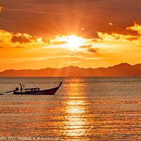 Buy canvas prints of Long tail boat on the Andaman Sea at sunset  by Kevin Hellon