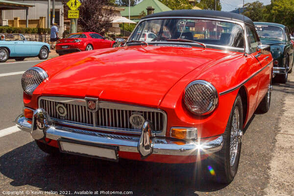 Classic red MGB roadster sports car Picture Board by Kevin Hellon