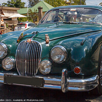 Buy canvas prints of Classic British Racing Green Jaguar roadster by Kevin Hellon