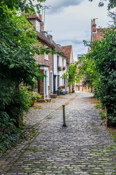 Narrow street in old Aylesbury Picture Board by Kevin Hellon