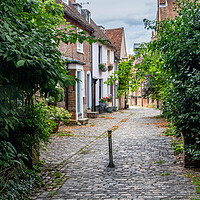 Buy canvas prints of Narrow street in old Aylesbury by Kevin Hellon