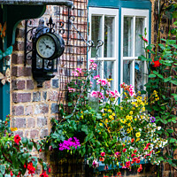Buy canvas prints of Flowers and a clock outside an English country cottage  by Kevin Hellon