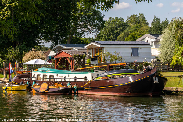 Dutch barge moored on the River Thames Picture Board by Kevin Hellon