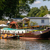 Buy canvas prints of Dutch barge moored on the River Thames by Kevin Hellon