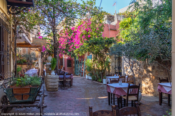 Outdoor restaurant in Chania Picture Board by Kevin Hellon