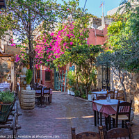 Buy canvas prints of Outdoor restaurant in Chania by Kevin Hellon