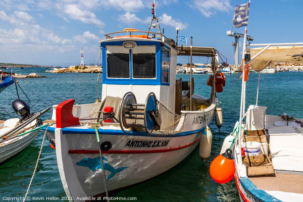 Greek fishing boat in harbour, Picture Board by Kevin Hellon