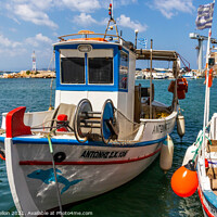 Buy canvas prints of Greek fishing boat in harbour, by Kevin Hellon