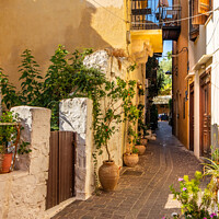Buy canvas prints of Narrow sreet in old Chania by Kevin Hellon