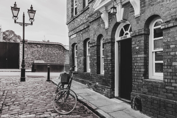 Bicycle in Church Street, Windsor Picture Board by Kevin Hellon