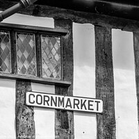 Buy canvas prints of Cornmarket sign on timber framed building by Kevin Hellon