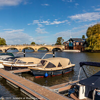Buy canvas prints of Boats moopred at Henley on Thames by Kevin Hellon